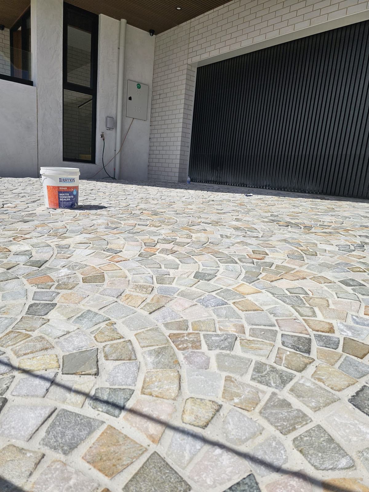 Close-up of the fan-pattern cobblestones